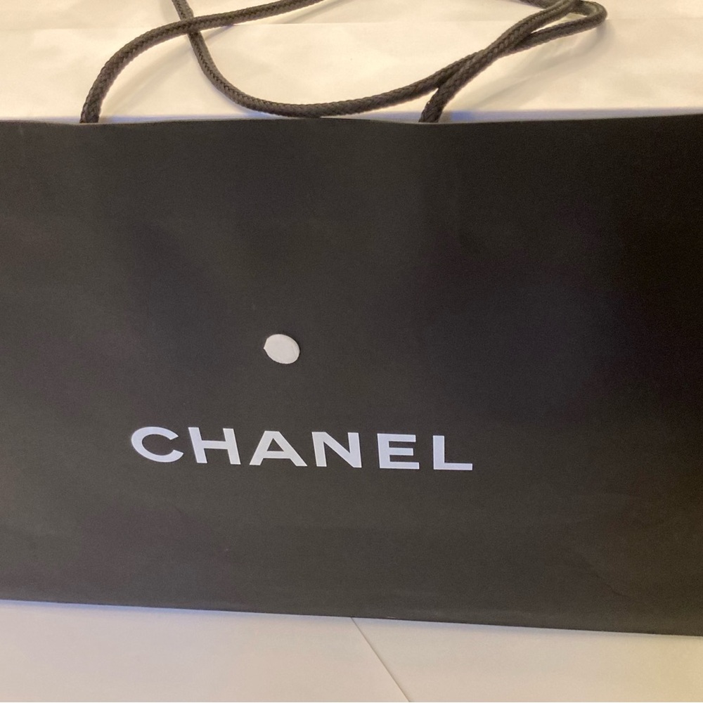 Classic Black White Chanel large shopping tote logo CHANEL white dot above name